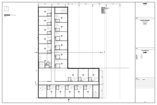 Level 1 floor plan A-101 with grid bubbles, dimension strings and unit tags.